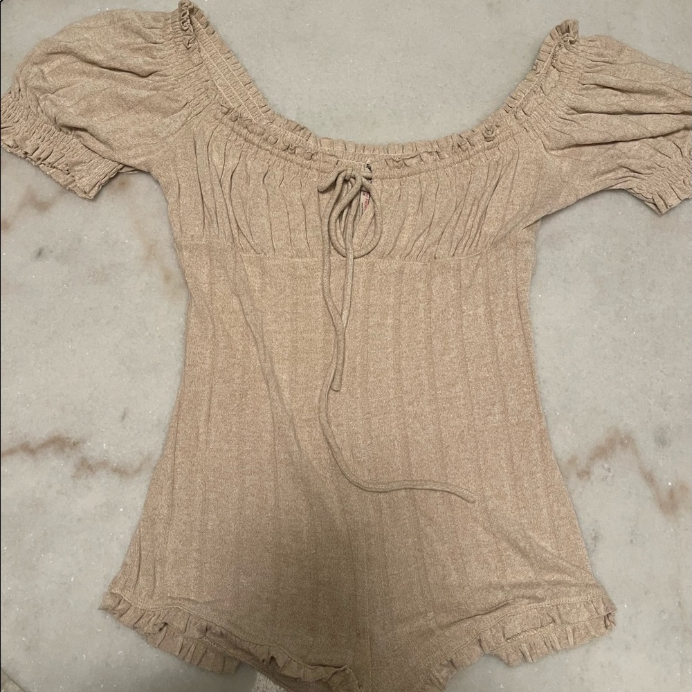 FREE PEOPLE romper. Super cute romper pretty tan/ oatmeal color.